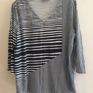 Cute black and white striped shirt.